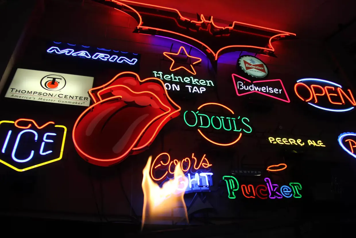 DIY LED neon sign being shaped on a template